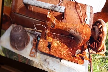 sönderbränd symaskin